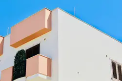Building With A Clock On The Side Of It