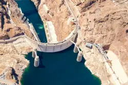 Large Bridge Over A River With A Train On It