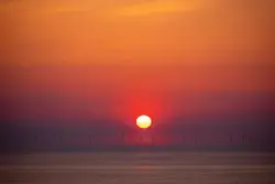 Sunset With A Sunset View Of A Beach