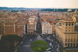 City With A Large Building And A Clock On It