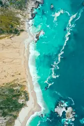 Beach With A Bunch Of Small Boats On It