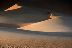 Desert With A Few Small Rocks