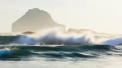 Large White Ocean With A Mountain