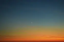 Large White Airplane Flying In The Sky