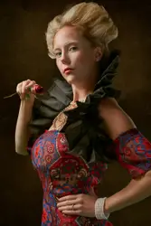 Woman Wearing A Red Dress And A Black Skirt
