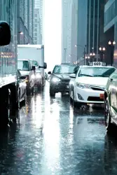 City Street With Cars And A Street Light