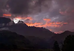 Mountain Range With A Cloudy Sky