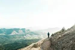 Person On A Mountain With A Backpack