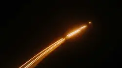 Large White Train Is On A Dark Night