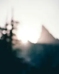 Lone Sun Shines Through A Cloudy Sky