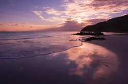 Beach With A Sunset And A Sunset View