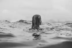 Large White Object Floating In The Water