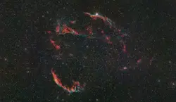 Blurry Photo Of A Red And Black Object