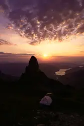 Lone Person Is Standing On A Rocky Hill