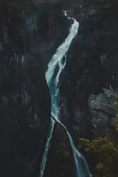 River With A Waterfall And A Mountain