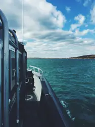 Boat Is Sitting On The Water