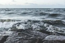 Large Wave Is Coming In On A Beach