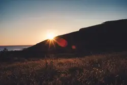 Silhouette of mountain during golden hour
