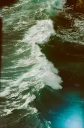 Aerial view of crashing waves