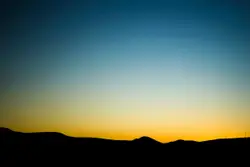 Sunset Is Seen In The Distance