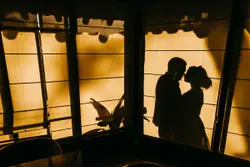 Silhouette of hugging man and woman