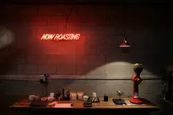 Red Now Roasting LED signage