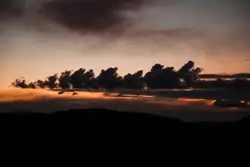 High angle photography of clouds and mountain