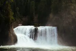 Waterfalls with trees on sides