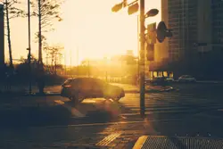 Early morning city traffic at sunrise