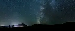 Silhouette photo of mountain during nighttime