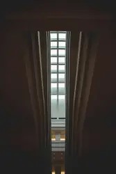 Train Is Seen Through A Glass Door