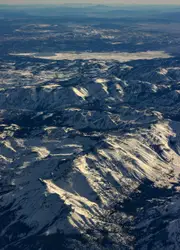 Aerial view of snow covered mountains during daytime