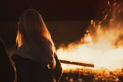 Enjoying the campfire.