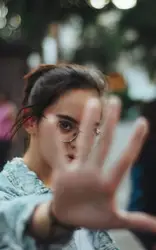 Selective focus photography of woman showing right left