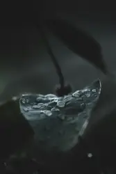 Glass With A Flower In It