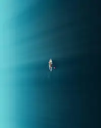 Kayak in deep blue water