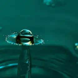 Water drops collisions. Hot water with kitchen cleaning