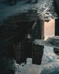 Reflection photo of high rise building