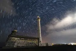 Lighthouse under the stars