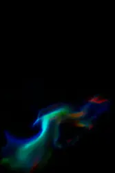 A blurry photo of a cell phone in the dark