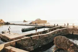 People walking on concrete pathway
