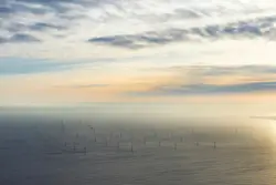 Ocean under white sky during daytime