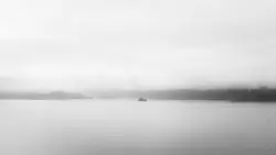 Grayscale photo of a body of water