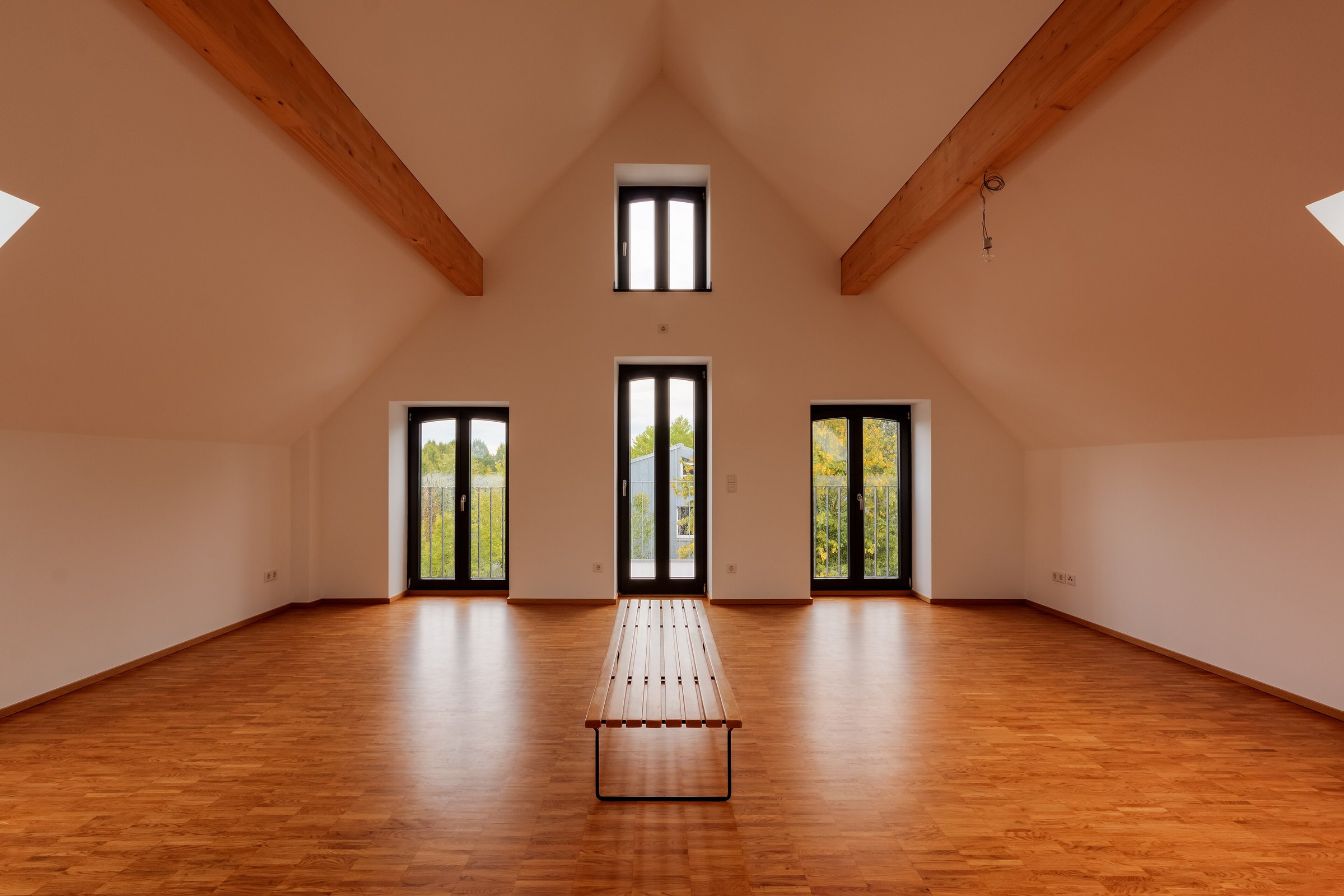 Room With A Large Open Door And A Large Window