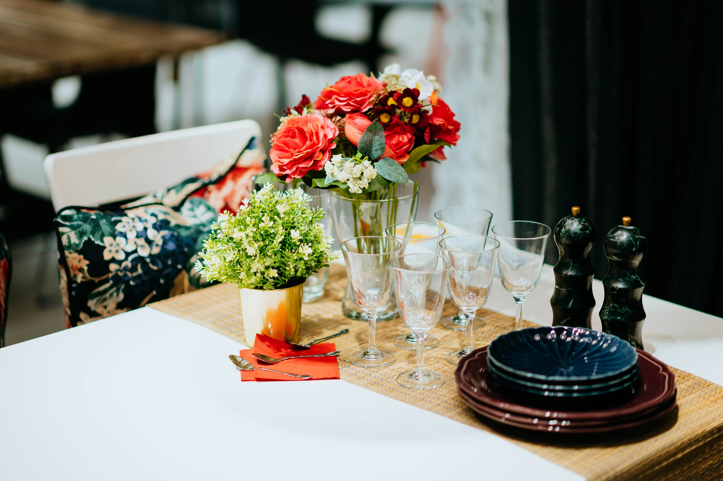 Table With A Vase With Flowers On It