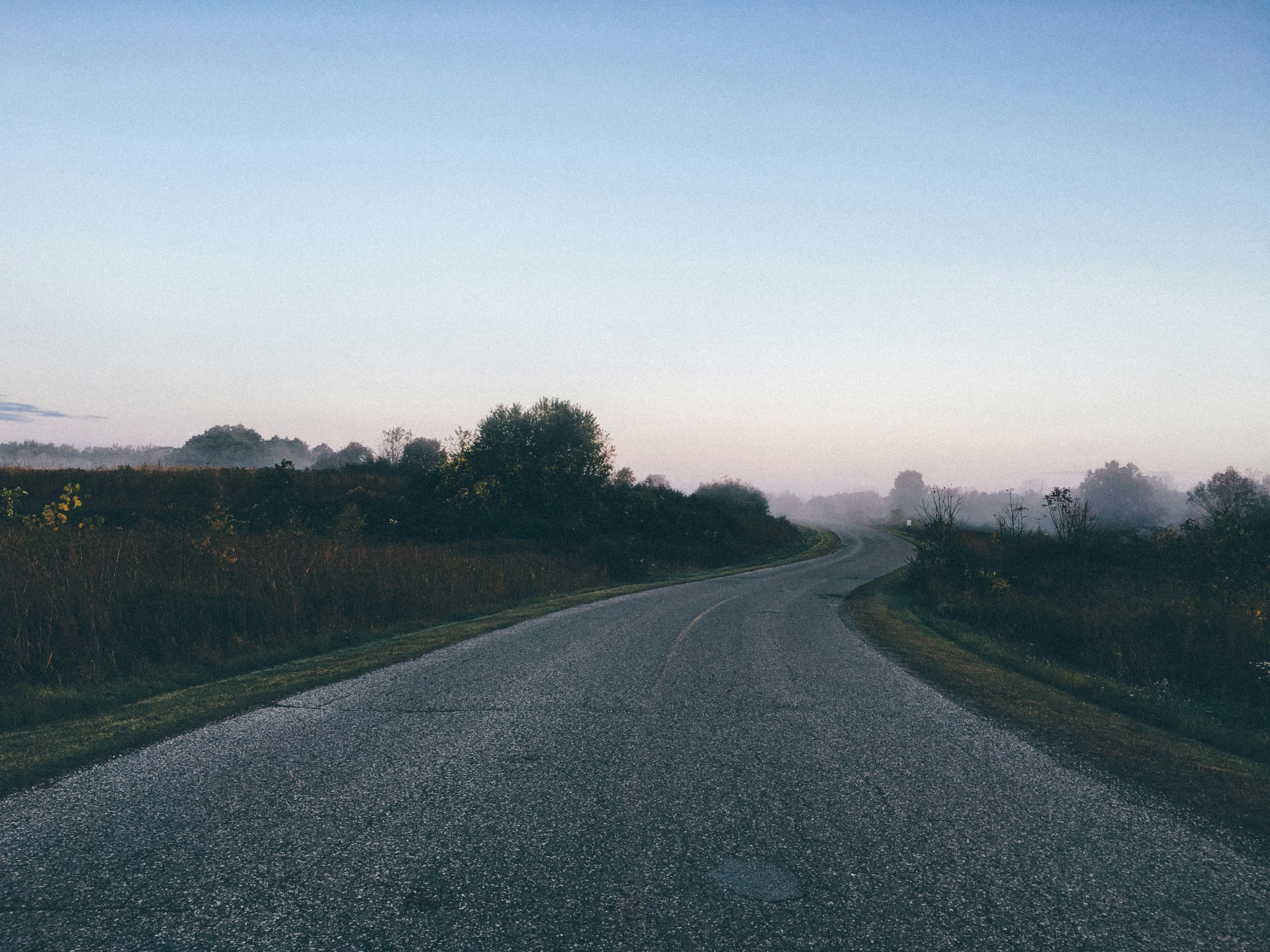 Road With A Couple Of Cars On It