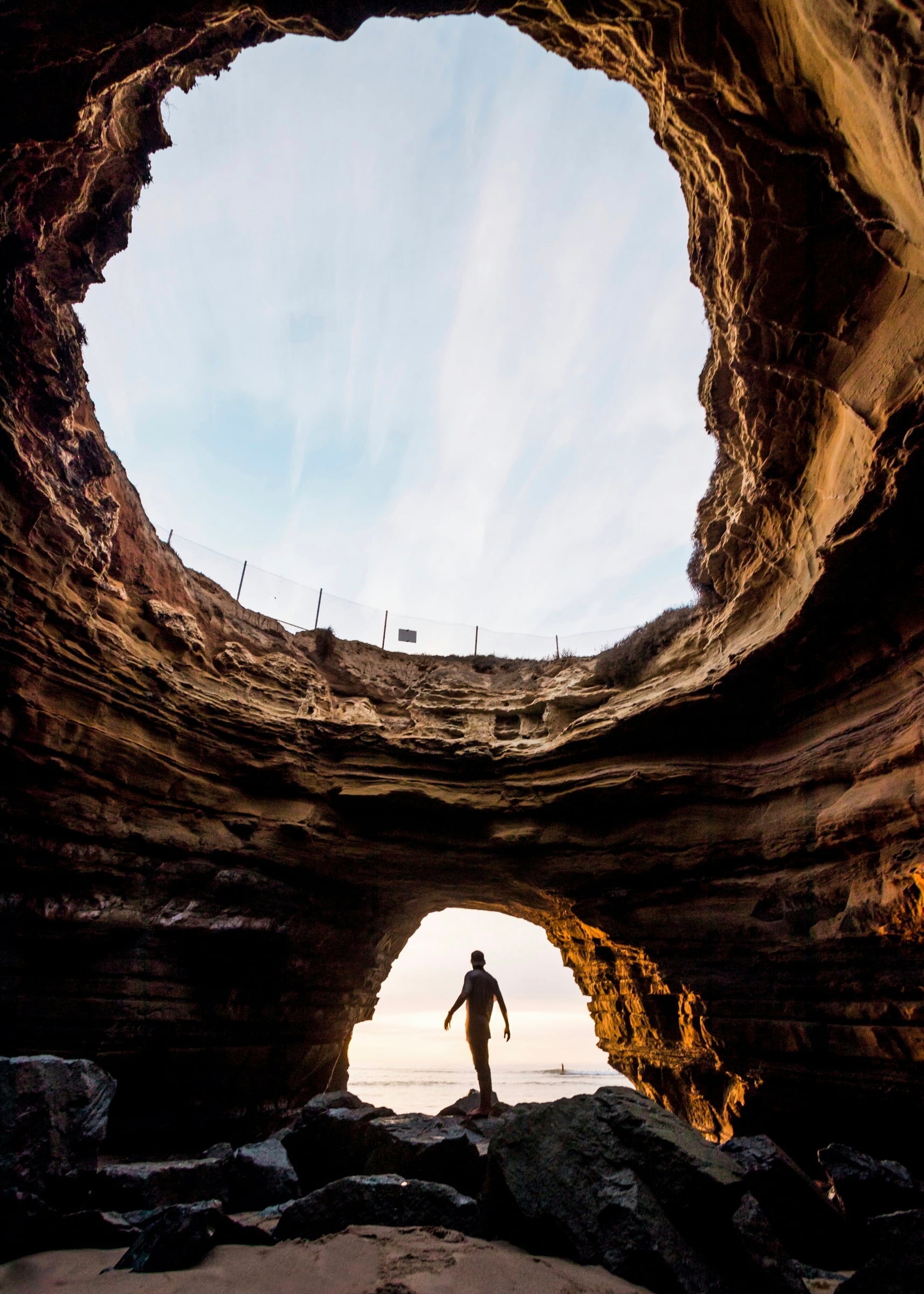Man Is Standing In The Middle Of A Tunnel